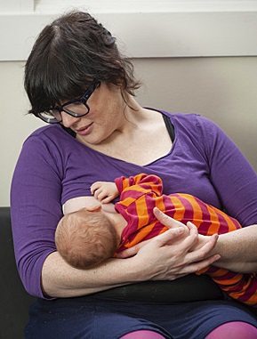 Image of a breastfeeding mother and her baby